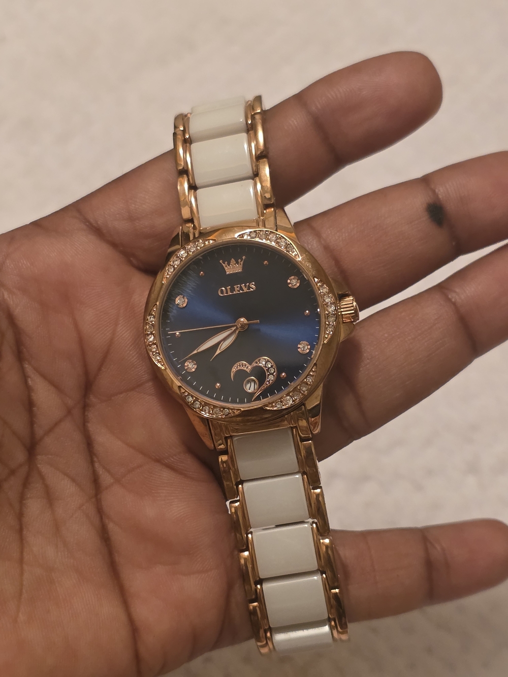 OLEVS Women’s Rose Gold and White Ceramic Watch with Blue Dial